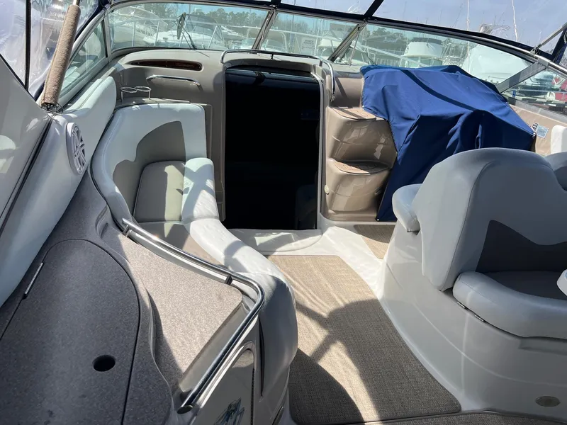 Slide: The Image of Interior of 2004 Wellcraft 3700 Martinique boat with seating and covered dashboard. - 6