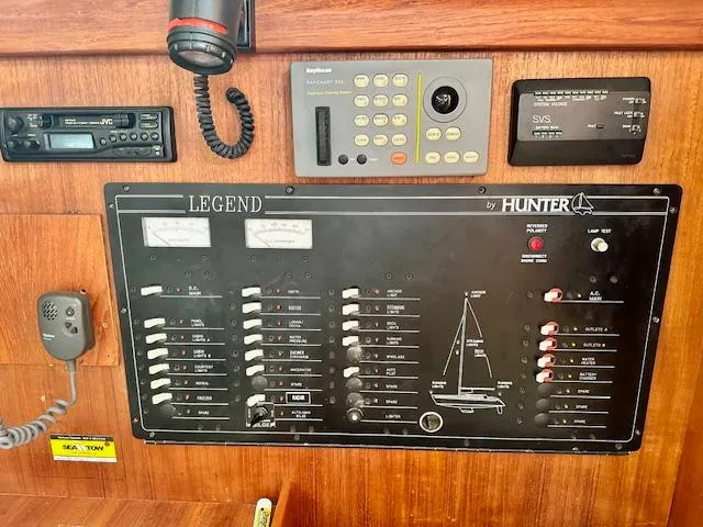 Slide: The Image of Control panel of a 1993 Hunter Legend 40.5 sailboat with navigation equipment. - 17
