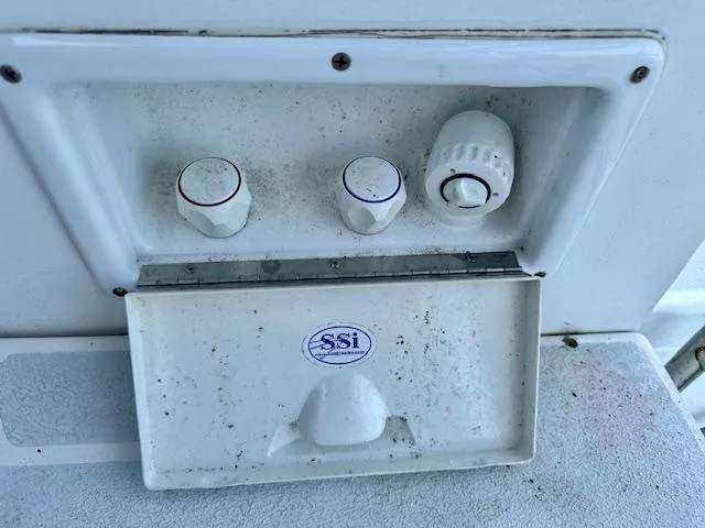 Slide: The Image of Control panel on a 1993 Hunter Legend 40.5 boat with SSI branding. - 20