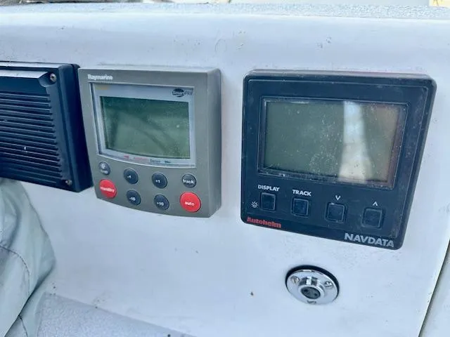 Slide: The Image of Control panel of a 1993 Hunter Legend 40.5 sailboat with navigation instruments. - 21