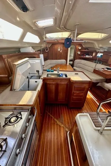 Slide: The Image of Interior of 1993 Hunter Legend 40.5 sailboat with wood finish and modern amenities. - 29