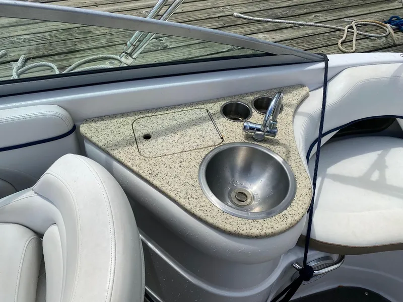 Slide: The Image of 2007 Four Winns 240 Horizon boat interior with sink and countertop. - 8
