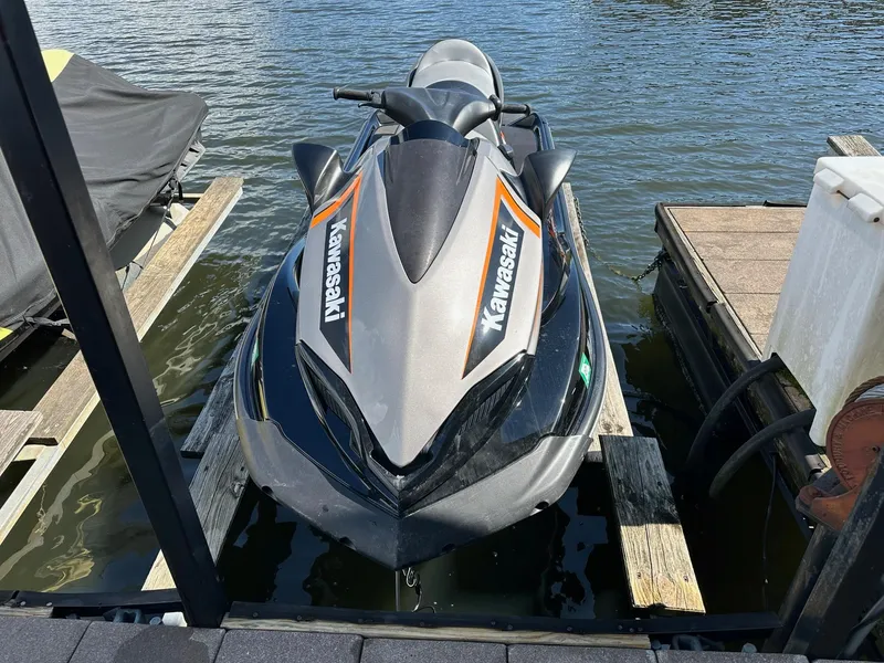 Slide: The Image of 2018 Kawasaki Jetski Ultra LX docked on calm water. - 6
