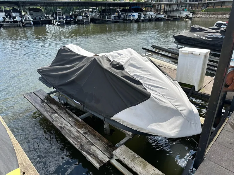 Slide: The Image of Covered 2018 Kawasaki Jetski Ultra LX on dock, surrounded by water and boats. - 8