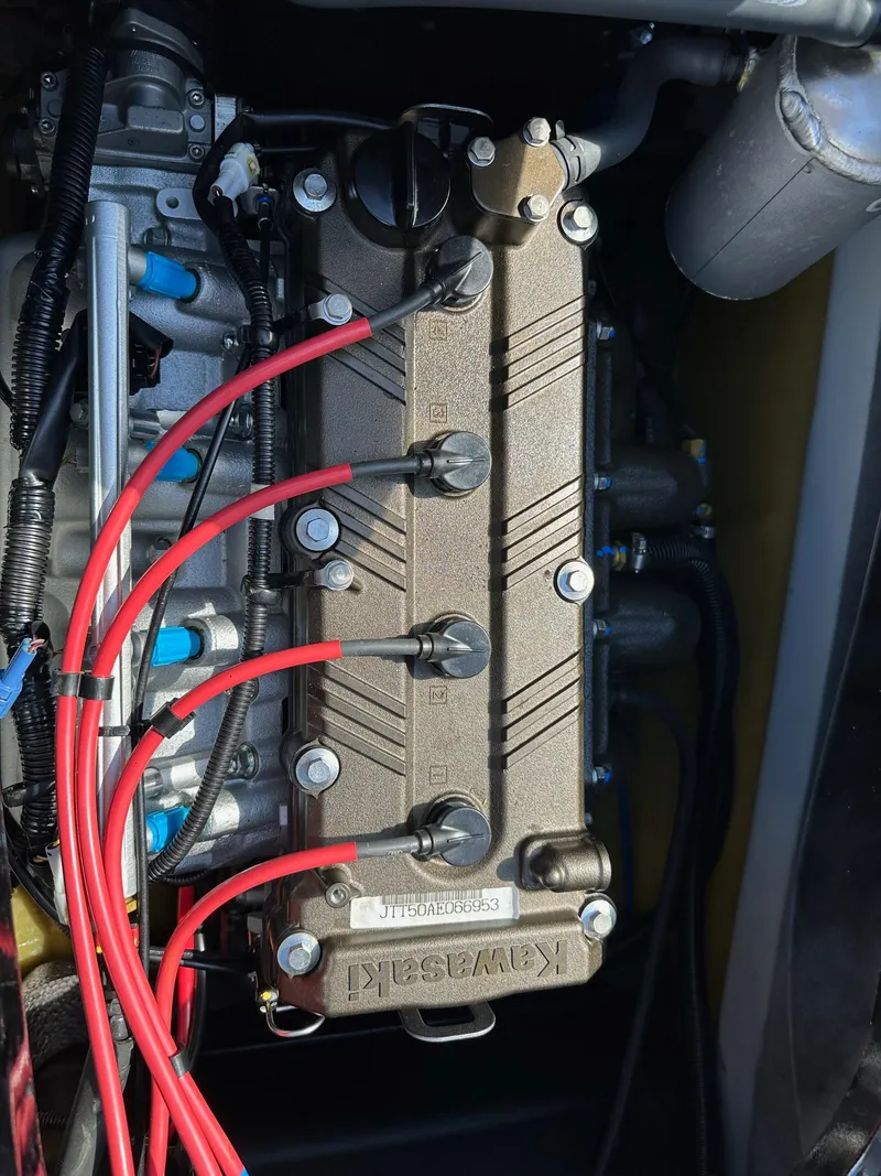 Slide: The Image of 2018 Kawasaki Jetski Ultra LX engine with visible red wires and components. - 9