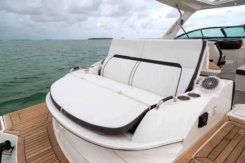 Slide: The Image of Manufacturer Provided Image: 2019 Sea Ray SLX 350 luxury boat with spacious seating on open water. - 17