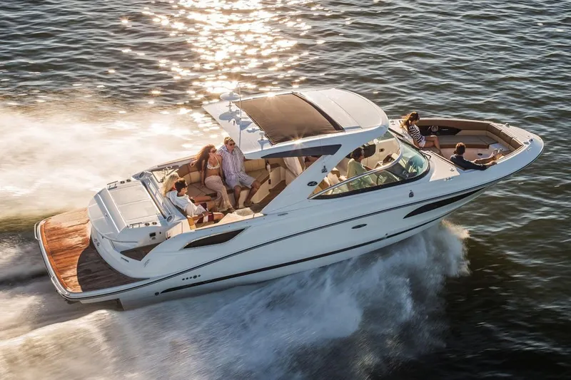 Slide: The Image of Manufacturer Provided Image: 2019 Sea Ray SLX 350 cruising on water with passengers enjoying the ride. - 3