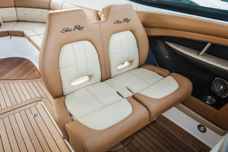 Slide: The Image of Manufacturer Provided Image: 2019 Sea Ray SLX 350 boat interior with tan and white leather seats. - 8