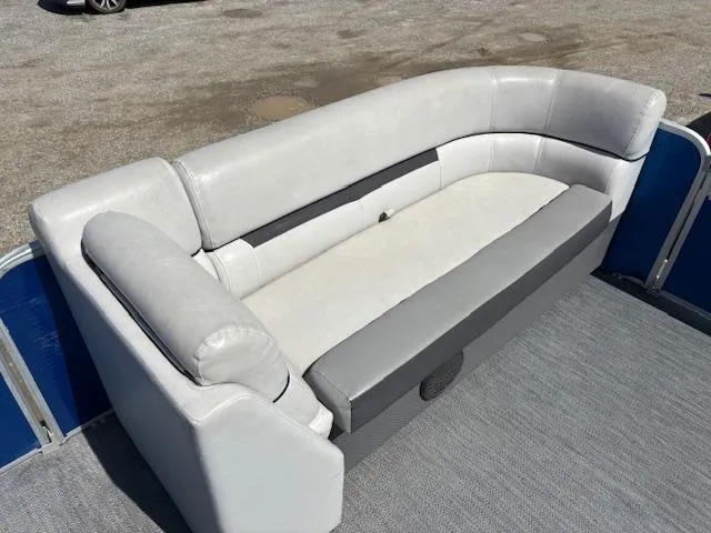 Slide: The Image of Gray seating on 2022 Sweetwater 2286 boat, outdoor setting. - 14