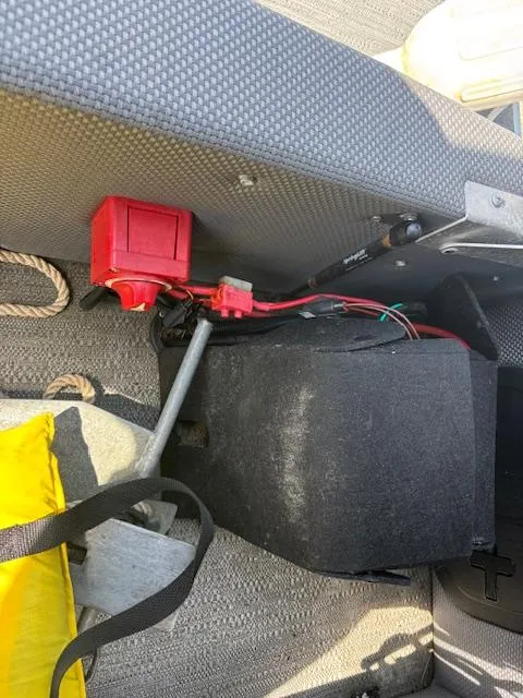 Slide: The Image of Interior of a 2022 Sweetwater 2286 boat showing wiring and battery compartment. - 18