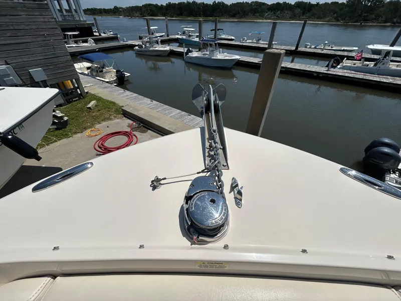 Slide: The Image of Bow view of 2018 Grady-White Freedom 235 boat docked at marina. - 30