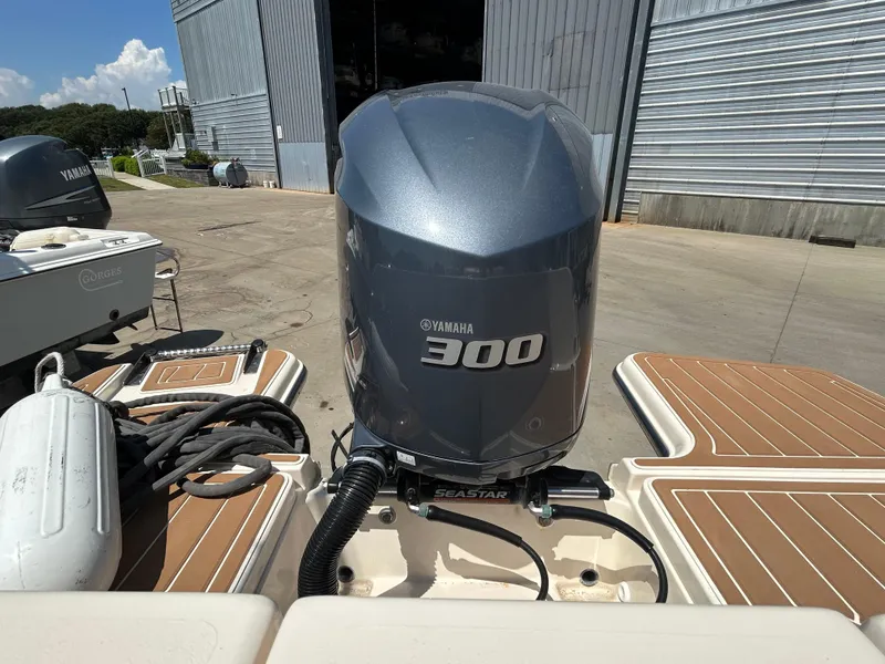 Slide: The Image of 2018 Grady-White Freedom 235 with Yamaha 300 outboard engine at dockside. - 8
