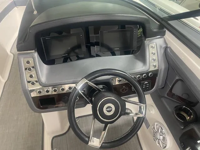 Slide: The Image of Steering console of 2018 Chaparral 267 SSX boat with dual displays and controls. - 13