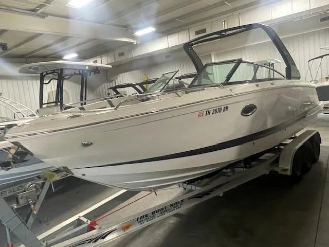 Slide: The Image of 2018 Chaparral 267 SSX boat on trailer in indoor storage facility. - 5
