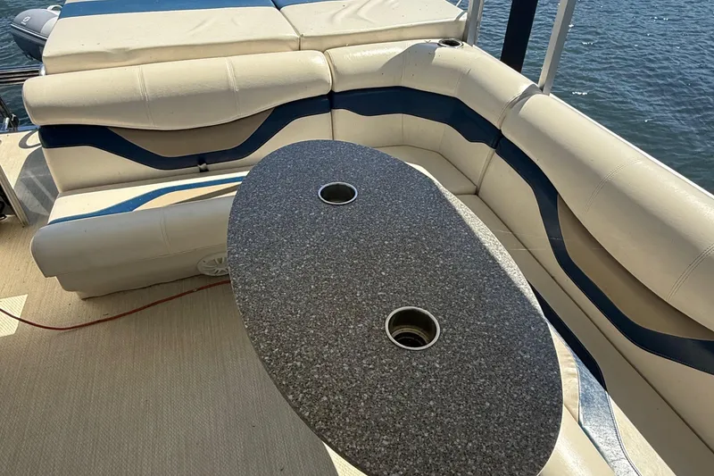 Slide: The Image of Luxury boat seating with granite table, King Mariner Custom 2016, on water. - 15