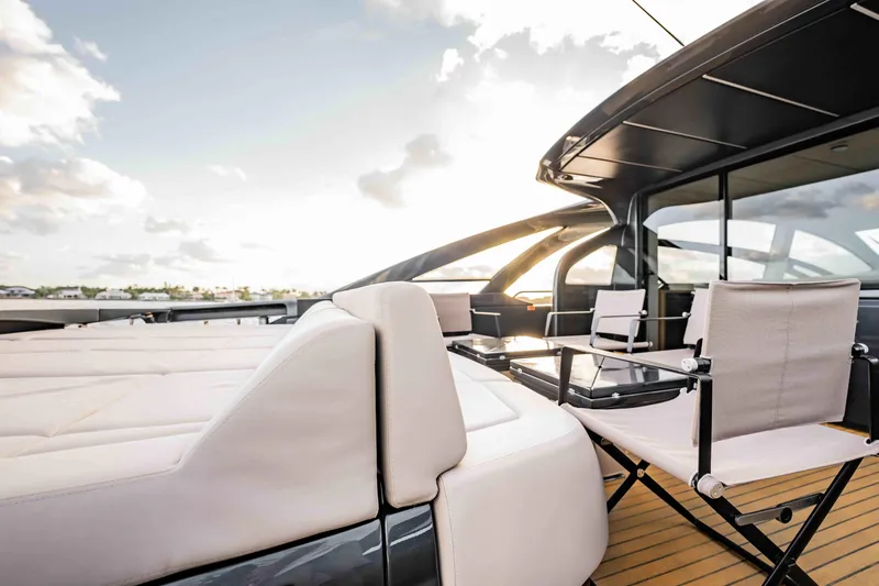 Slide: The Image of Luxurious 2017 Pershing 70 yacht deck with elegant seating and modern design. - 10