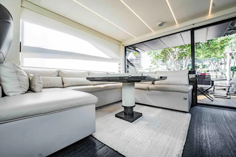 Slide: The Image of Luxurious interior of 2017 Pershing 70 yacht with modern seating and sleek design. - 15