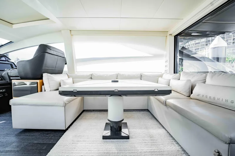 Slide: The Image of Luxurious interior of a 2017 Pershing 70 yacht with elegant seating and modern design. - 16
