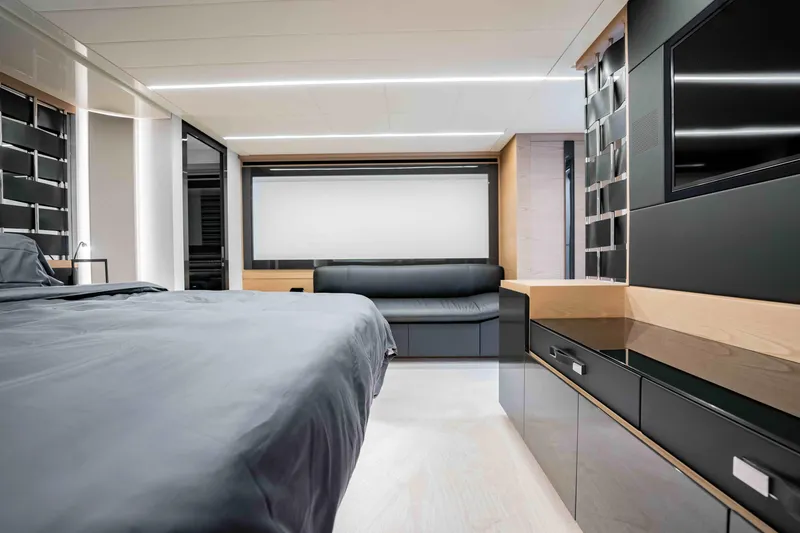 Slide: The Image of Luxurious interior of 2017 Pershing 70 yacht with modern design and sleek furnishings. - 28