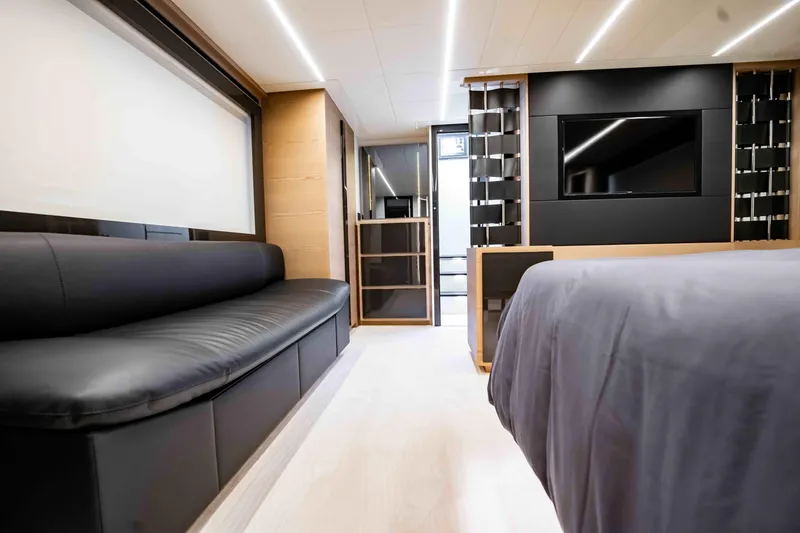 Slide: The Image of Luxurious interior of 2017 Pershing 70 yacht with modern design and sleek furnishings. - 29