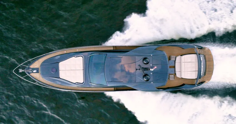 Slide: The Image of Aerial view of 2017 Pershing 70 yacht cruising on water. - 4