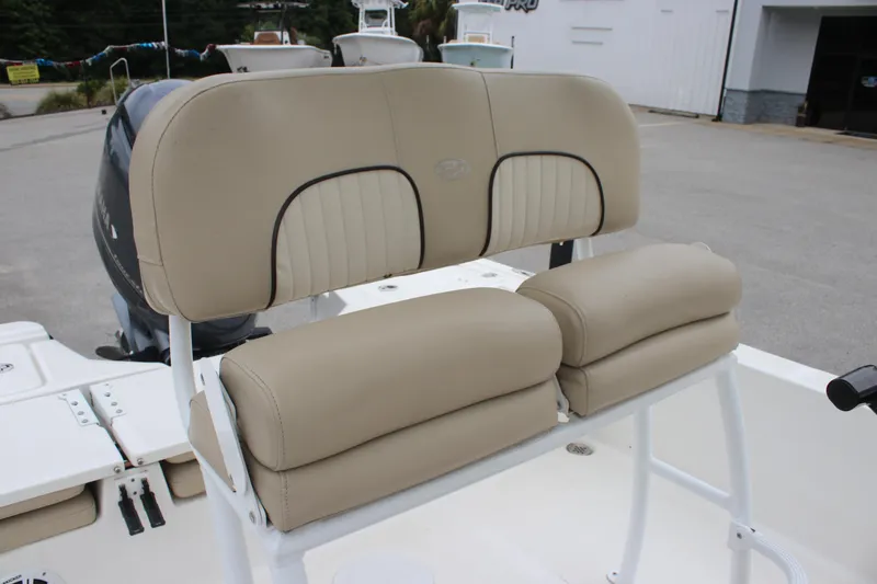 Slide: The Image of 2017 Sea Fox 220 Viper boat seat with beige upholstery and white frame. - 10