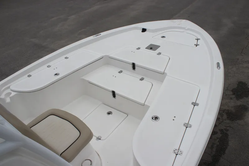 Slide: The Image of 2017 Sea Fox 220 Viper boat deck with storage compartments and seating. - 15