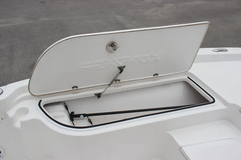 Slide: The Image of Open storage compartment on a 2017 Sea Fox 220 Viper boat. - 18