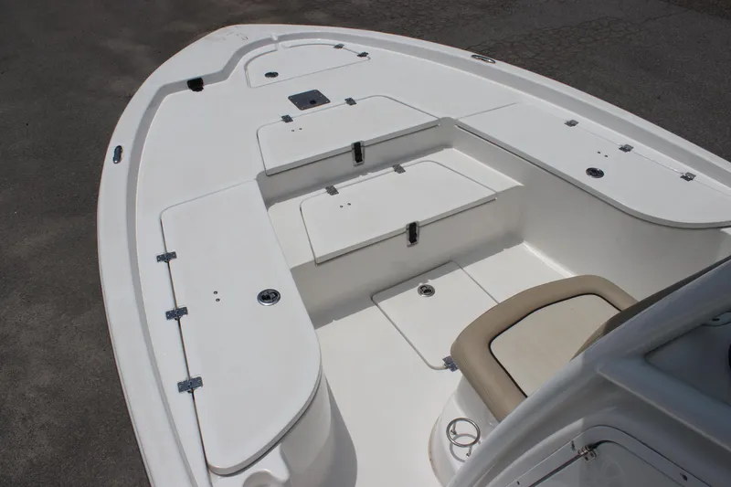 Slide: The Image of 2017 Sea Fox 220 Viper boat deck with storage compartments and seating. - 22