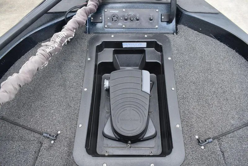 Slide: The Image of 1997 Stratos 282 DC boat deck with foot pedal and control panel. - 11