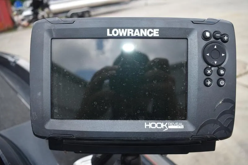 Slide: The Image of Lowrance Hook Reveal fish finder on a 1997 Stratos 282 DC boat. - 20