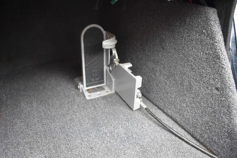 Slide: The Image of 1997 Stratos 282 DC boat interior with foot pedal mechanism. - 21