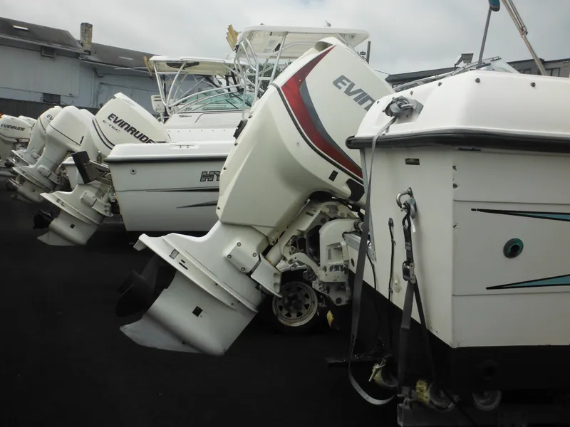 Slide: The Image of Boats with Evinrude outboard motors, featuring a 1996 Hydra-Sports 2000 DC model. - 10