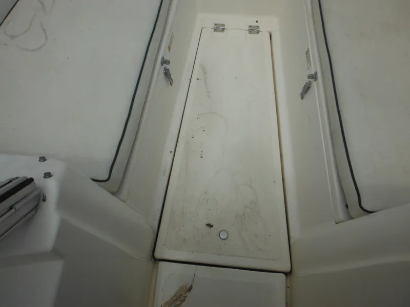 Slide: The Image of 1996 Hydra-Sports 2000 DC boat deck with storage compartment. - 22