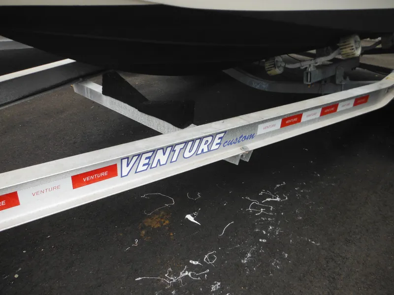 Slide: The Image of Boat trailer with "Venture Custom" branding, supporting a 1996 Hydra-Sports 2000 DC. - 3