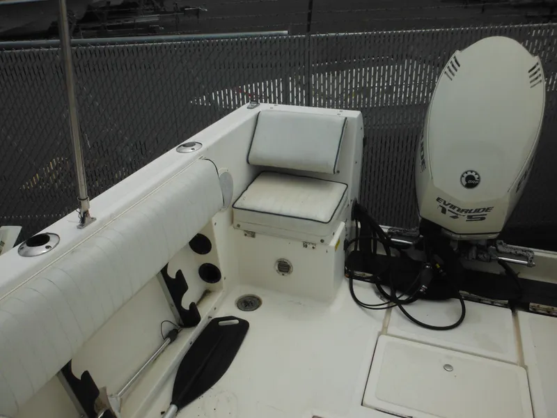 Slide: The Image of 1996 Hydra-Sports 2000 DC boat interior with Evinrude motor and seating. - 45