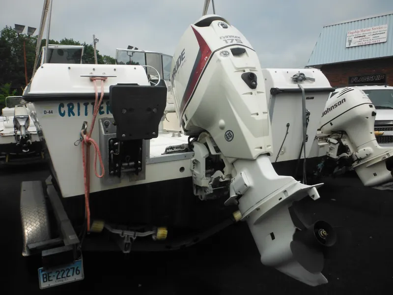 Slide: The Image of 1996 Hydra-Sports 2000 DC boat with dual outboard motors on a trailer. - 5