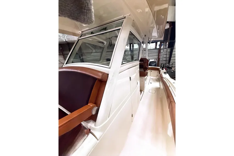 Slide: The Image of 2016 Scout 350 LXF boat interior with sleek design and leather seating. - 18