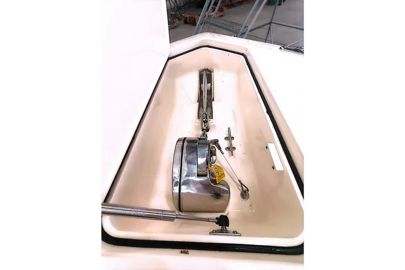 Slide: The Image of 2016 Scout 350 LXF boat anchor compartment with stainless steel hardware. - 24