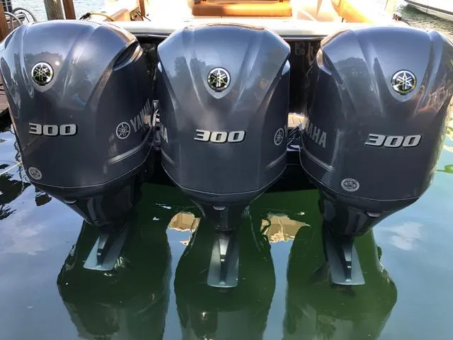 Slide: The Image of Three Yamaha 300 outboard engines on a 2016 Scout 350 LXF boat. - 4