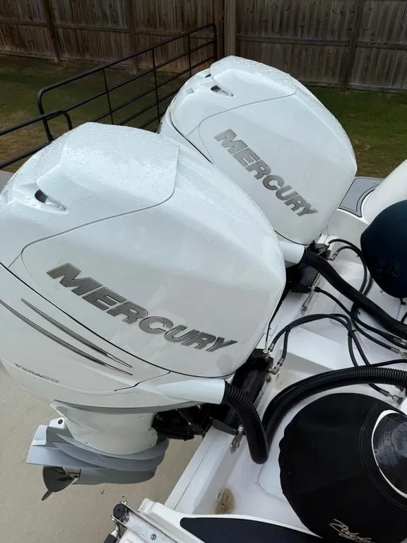 Slide: The Image of Twin Mercury outboard engines on a 2022 Sea Fox 328 Commander boat. - 6