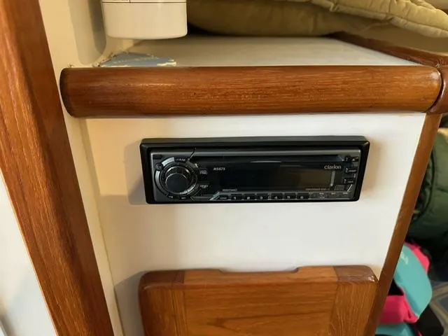 Slide: The Image of Clarion stereo system in 2003 Pursuit 3070 Express boat interior. - 6