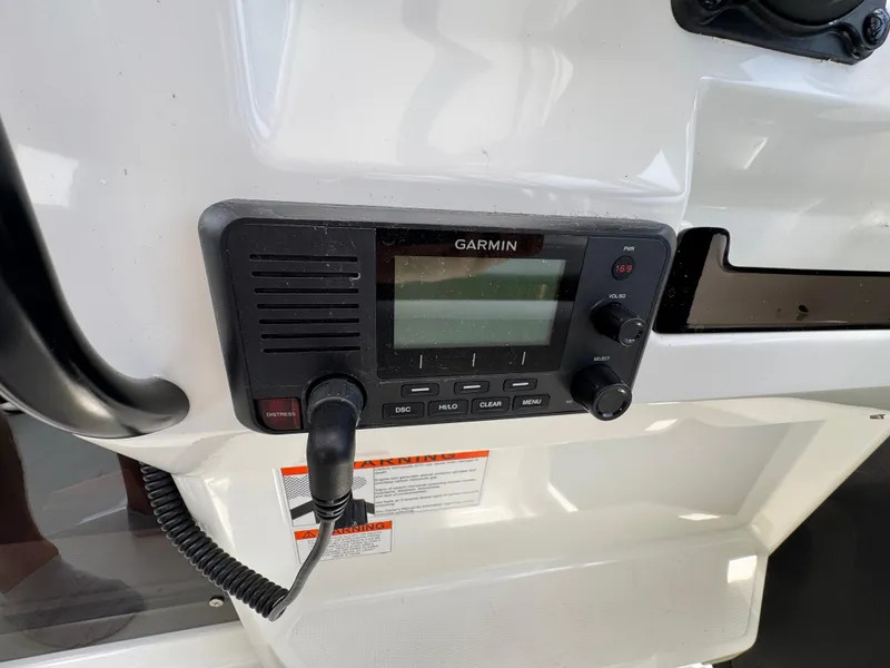 Slide: The Image of Garmin marine radio on 2022 Beneteau Flyer 9 SUNdeck boat dashboard. - 17