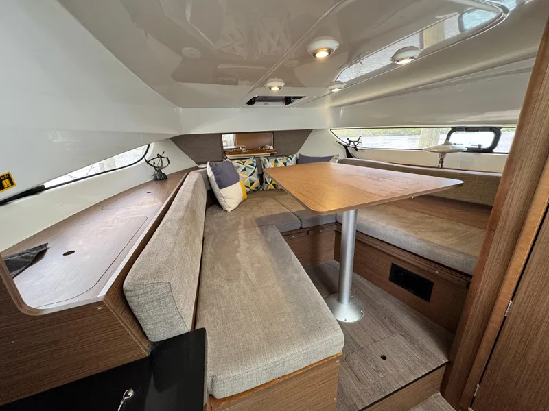 Slide: The Image of 2022 Beneteau Flyer 9 SUNdeck cabin interior with seating and table. - 20
