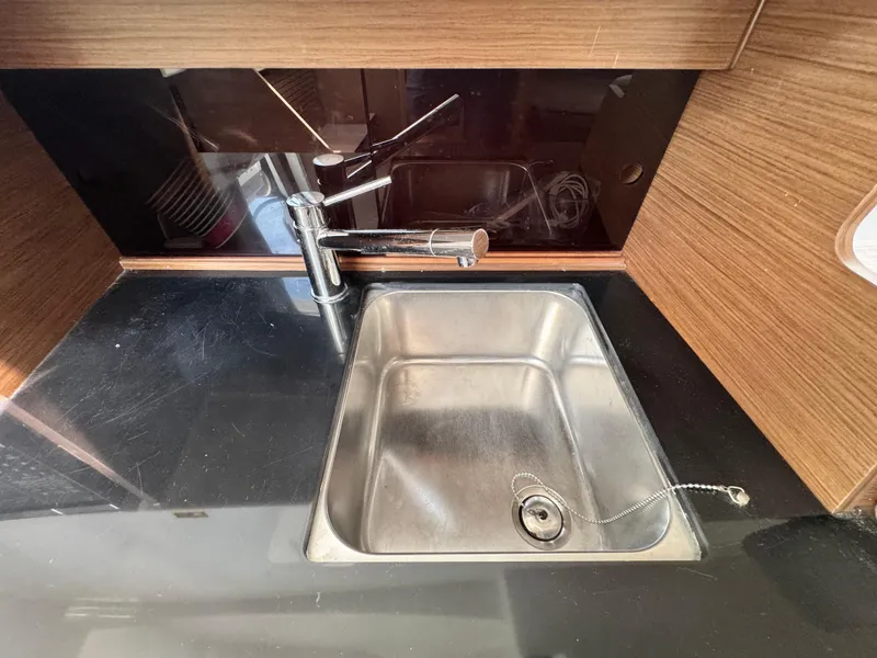 Slide: The Image of Stainless steel sink in 2022 Beneteau Flyer 9 SUNdeck boat kitchen area. - 39