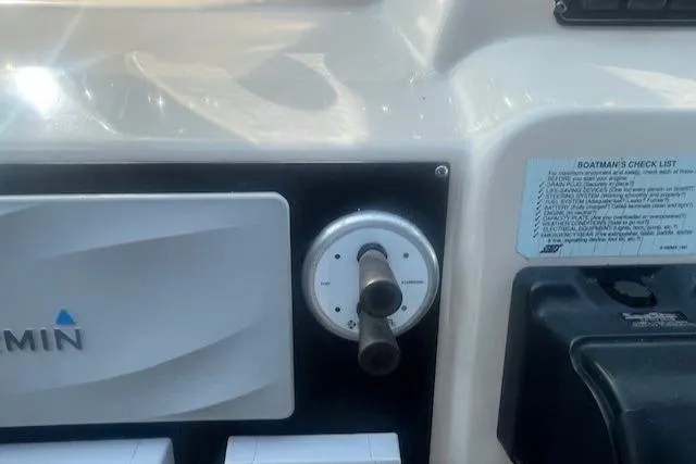 Slide: The Image of Control panel of 2000 Cruisers Yachts 4450 Express Motoryacht with Garmin equipment. - 23