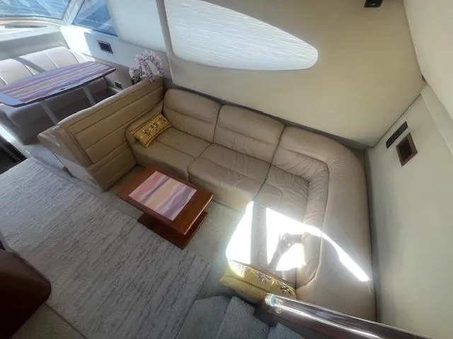 Slide: The Image of Luxurious interior of 2000 Cruisers Yachts 4450 Express Motoryacht with beige leather seating. - 27