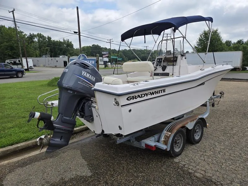 Slide: The Image of 2002 Grady-White 209 ESCAPE boat on trailer with Yamaha outboard motor. - 3