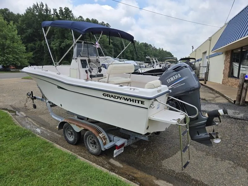 Slide: The Image of 2002 Grady-White 209 ESCAPE boat on trailer with Yamaha outboard motor. - 4