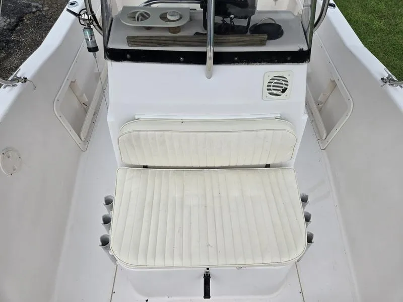 Slide: The Image of 2002 Grady-White 209 ESCAPE boat interior with white seating and console. - 8